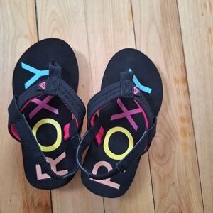 Roxy Kids Black Flip Flops with Pink, Yellow & Blue Logo